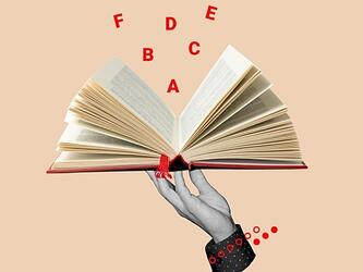 hand holding open book with letters flying out